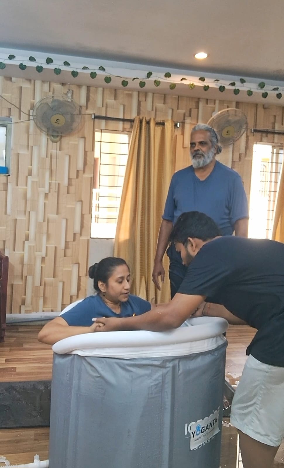 Dr. Vinayana Jain in the ice bath as trainers guide the session at the Yoganta Ice Bath Instructor Course (YCIBI) workshop in Hyderabad.