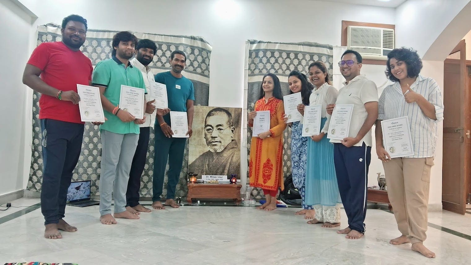 Students receiving Reiki certification from Yoganta.