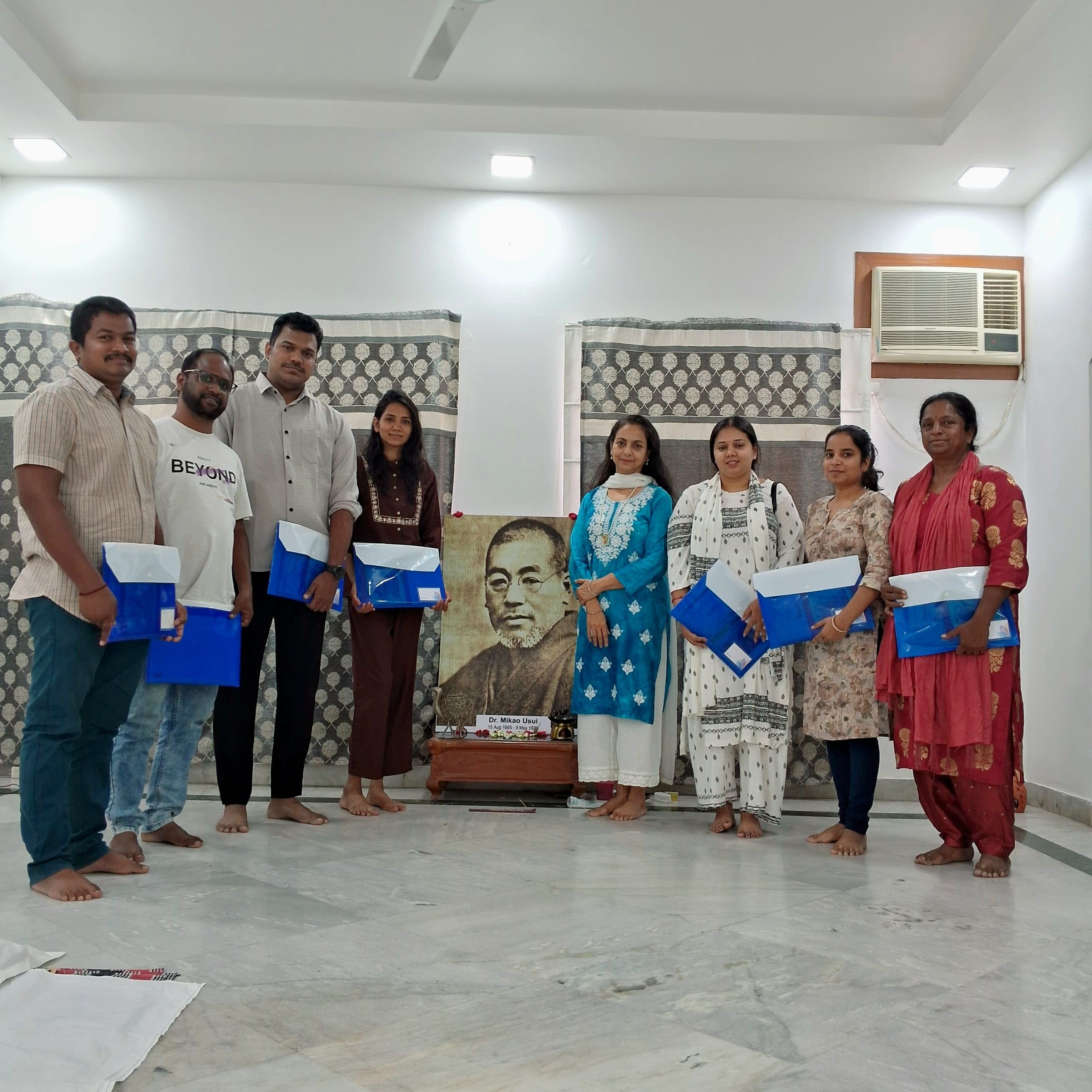 Group photo after a Yoganta Reiki certification program.